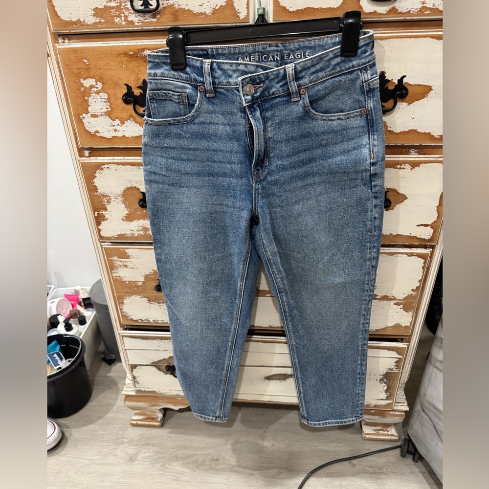American Eagle mom jeans with asymmetrical waist.